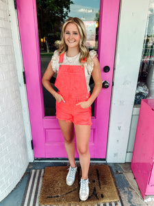 Coral distressed overalls