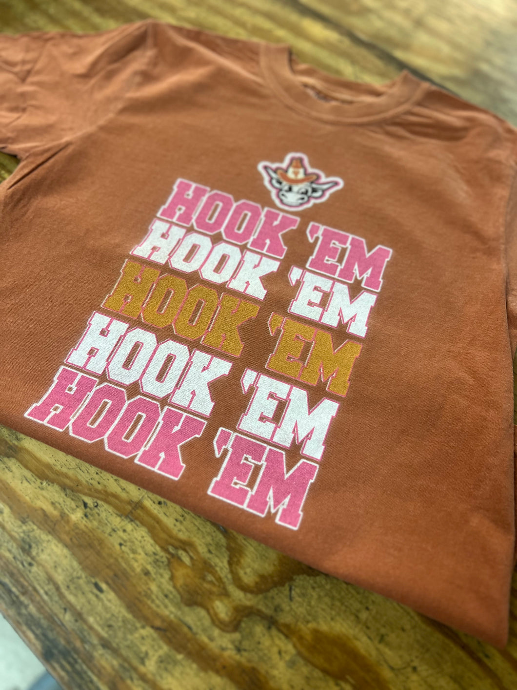 Burnt orange Hook em repeat tee